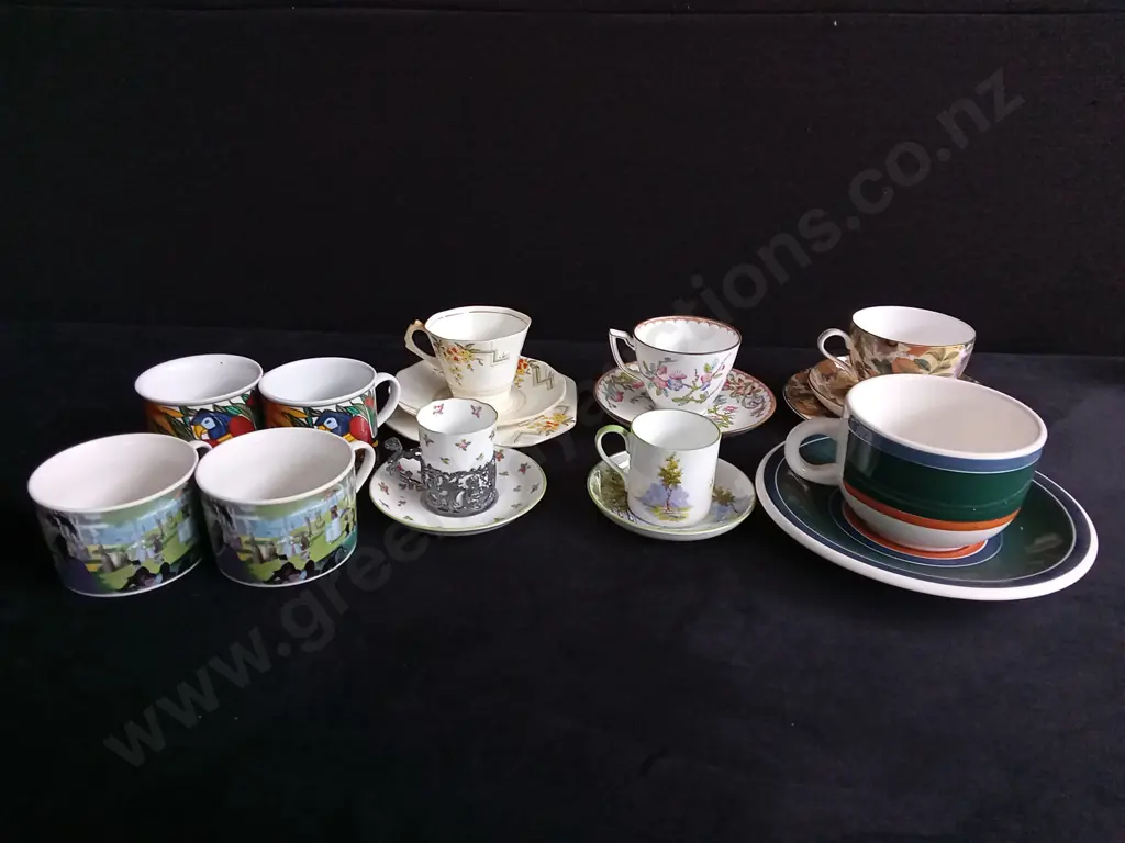 COLLECTION OF CUPS AND SAUCERS Image 1++