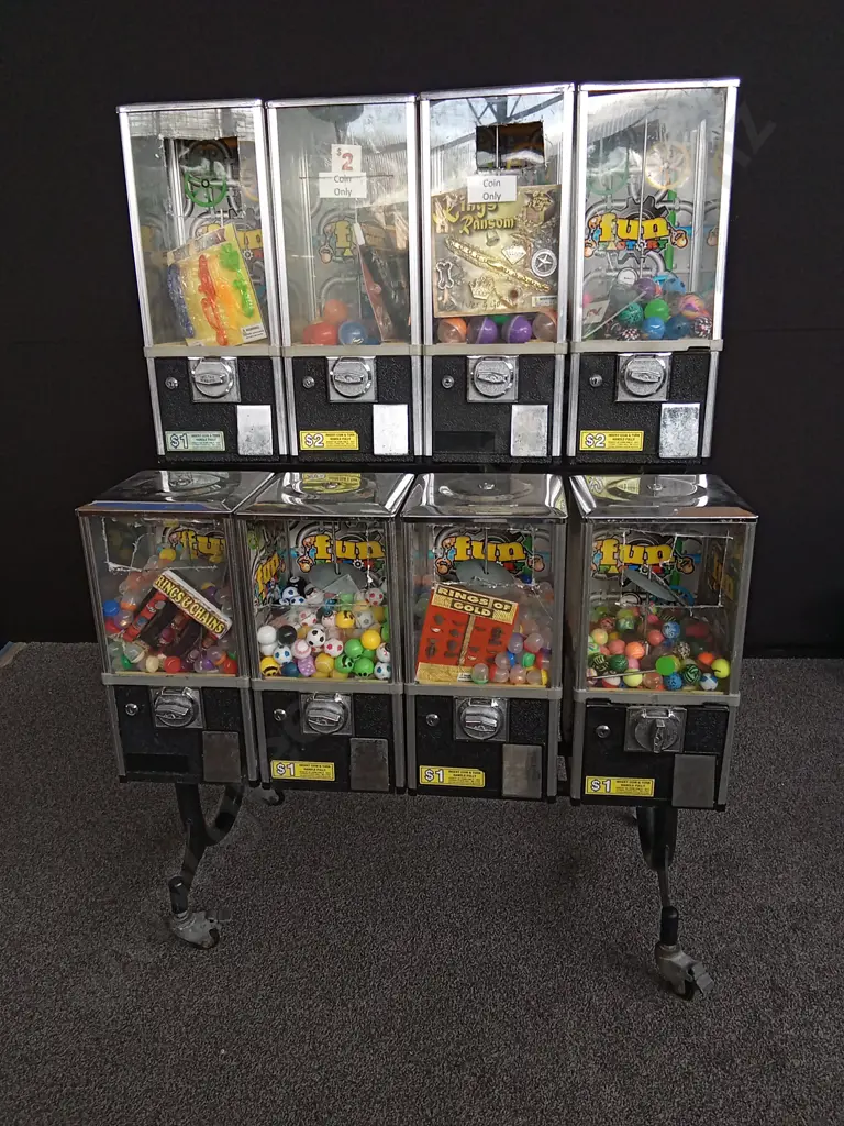CREATIVE PRODUCTS TOY VENDING MACHINE SET - 8 MACHINES ON TROLLEY FRONT PERSPEX DAMAGED ON 7 OF THEM Image 1++