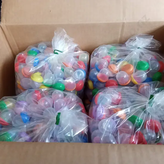BOX OF PLASTIC CAPSULES FILLED WITH COSTUME RINGS FOR VENDING MACHINE