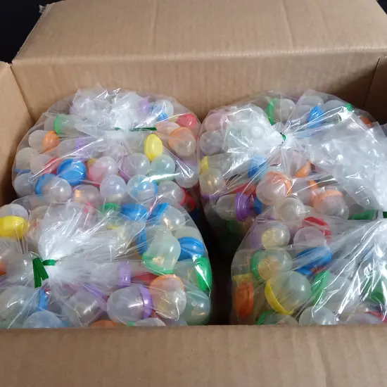 BOX OF PLASTIC CAPSULES FILLED WITH COSTUME JEWELLERY FOR VENDING MACHINE