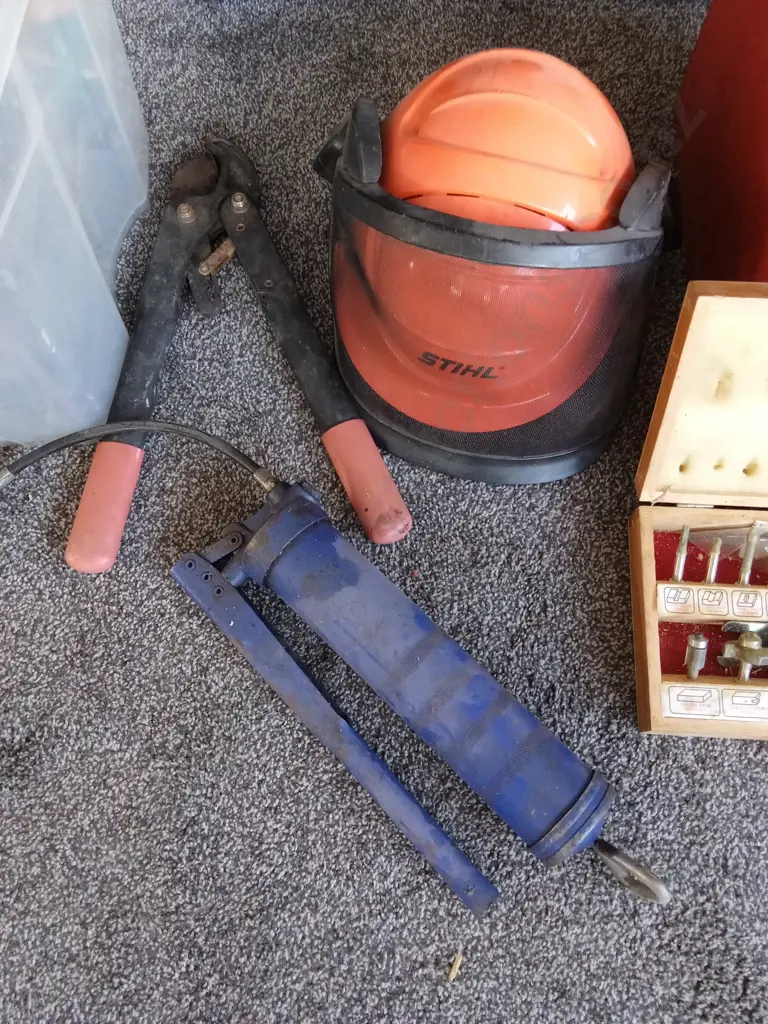PLASTIC BIN CONTAINING VARIOUS HAND TOOLS SAWS, CHISELS, CLAMPS, SCREWDRIVERS PLUS STIHL SAFETY HELMET HELMET, BO Image 1++