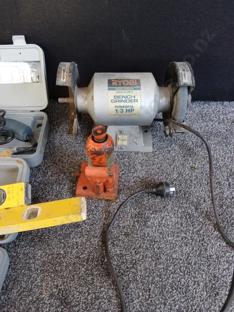 RYOBI BENCH GRINDER, 2 SPIRIT LEVELS, 2 ROLLS OF AUGER BITS, BOX OF HOLE SAWS, COLT TOOL Image 1++