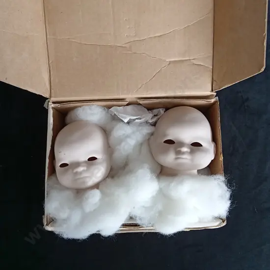 PAIR OF VINTAGE CERAMIC DOLL HEADS