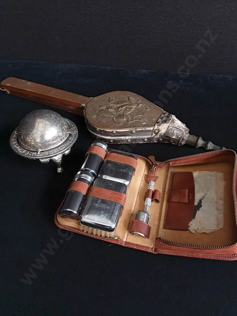 3 PIECES MIX OF VINTAGE ITEMS INCLUDING FIREPLACE BELLOWS, LEATHER CASED GROOMING KIT AND SILVER PLATED COVERED DISH Image 1++