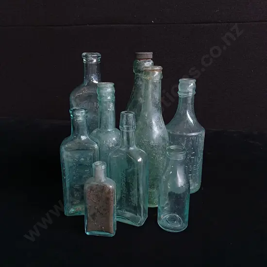 9 VINTAGE CLEAR GLASS BOTTLES