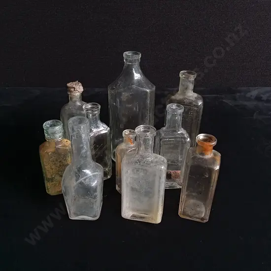 10 VINTAGE CLEAR GLASS BOTTLES