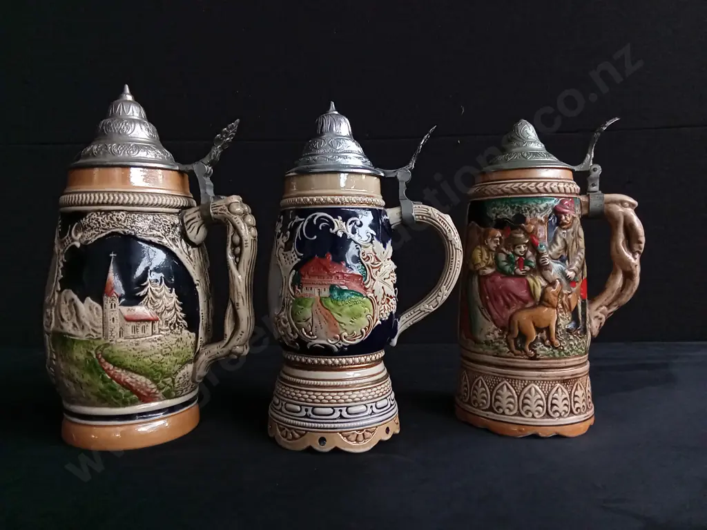7 VINTAGE GERMAN STEINS, 2 ARE CLOCKWORK MUSICAL, ACTIVATED WHEN LIFTED Image 1++