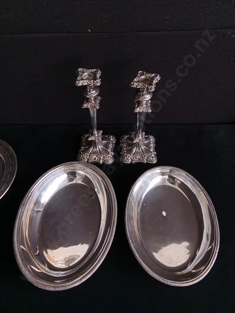 8 PIECES SILVER PLATED ITEMS, INCLUDING CANDLESTICK HOLDERS AND SERVING PLATES Image 1++