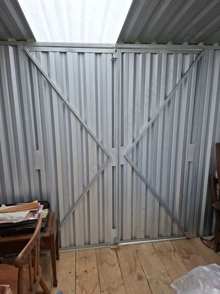 SHED #1: 3.9M X 3.1M GALVANISED PITCHED ROOF SHED WITH 2 SETS OF DOUBLE DOORS AND CLEAR LIGHT PANELS Image 1++