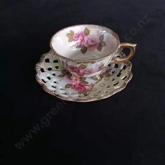 IRIDESCENT FLORAL TEA CUP AND SAUCER