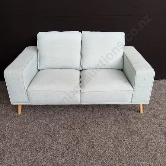 TWO SEATER BLUE FABRIC COUCH - COMFORTABLE BUT STAINED SO REQUIRES CLEAN. 1.65M WIDE
