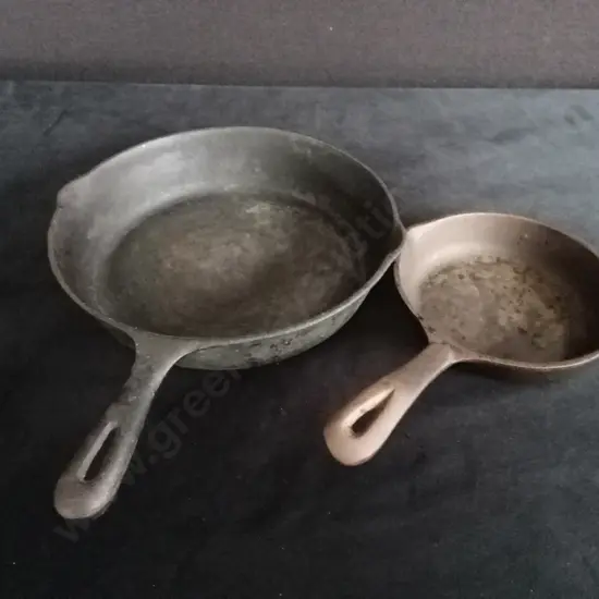 2 CAST IRON PANS