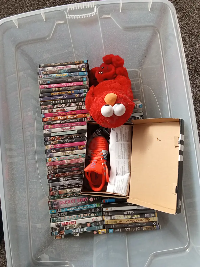 BOX OF ASSORTED DVDS, 2 TEDDIES AND ADIDAS FOOTBALL BOOTS KIDS SIZE 28 Image 1++