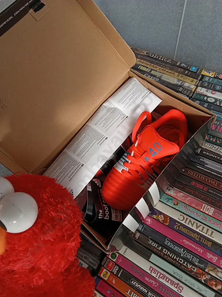 BOX OF ASSORTED DVDS, 2 TEDDIES AND ADIDAS FOOTBALL BOOTS KIDS SIZE 28 Image 1++