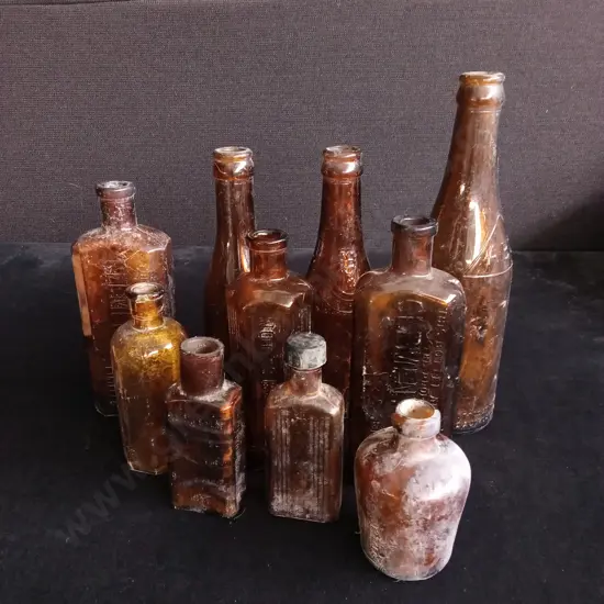 10 VINTAGE AMBER GLASS BOTTLES