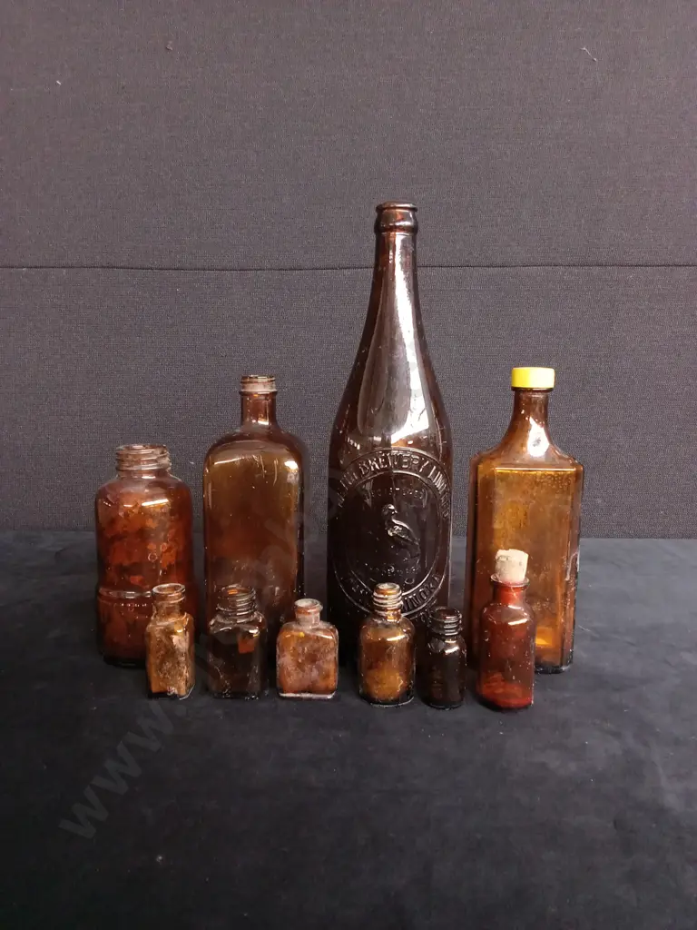 10 AMBER GLASS BOTTLES Image 1++