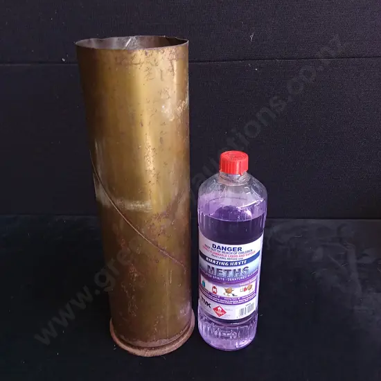 VINTAGE BRASS ARTILLERY SHELL CASTING AND METHYLATED SPIRITS