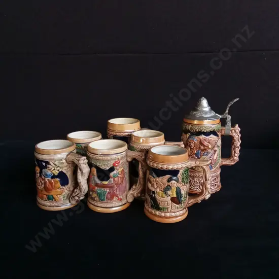 7 PIECES VINTAGE BEER JUGS INCLUDING ONE MUSICAL