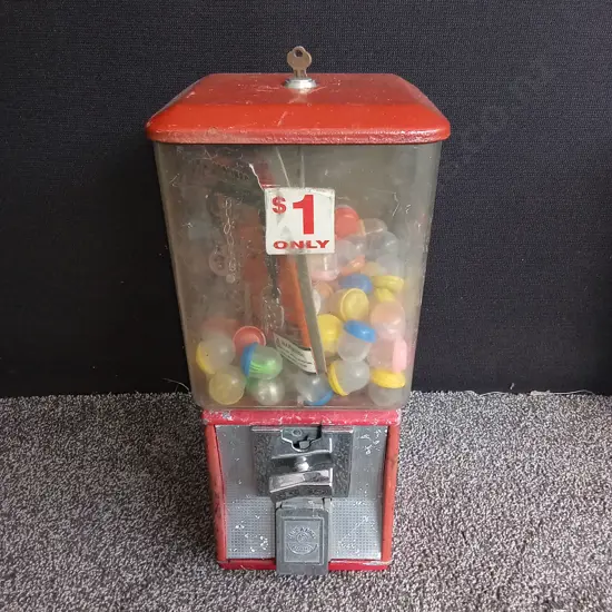 NORTHWESTERN SINGLE RED VENDING MACHINE COMPLETE WITH STOCK