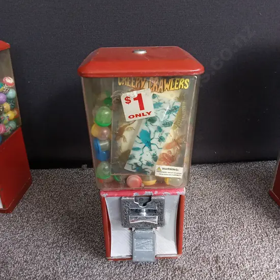 NORTHWESTERN SINGLE RED VENDING MACHINE COMPLETE WITH STOCK