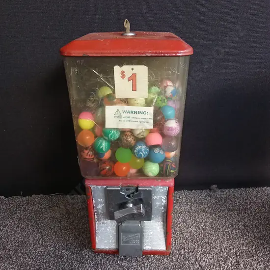 NORTHWESTERN SINGLE RED VENDING MACHINE COMPLETE WITH STOCK