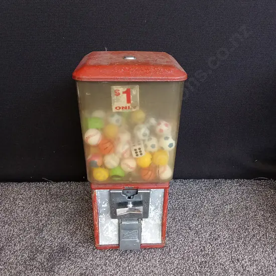 NORTHWESTERN SINGLE RED VENDING MACHINE WITH STOCK