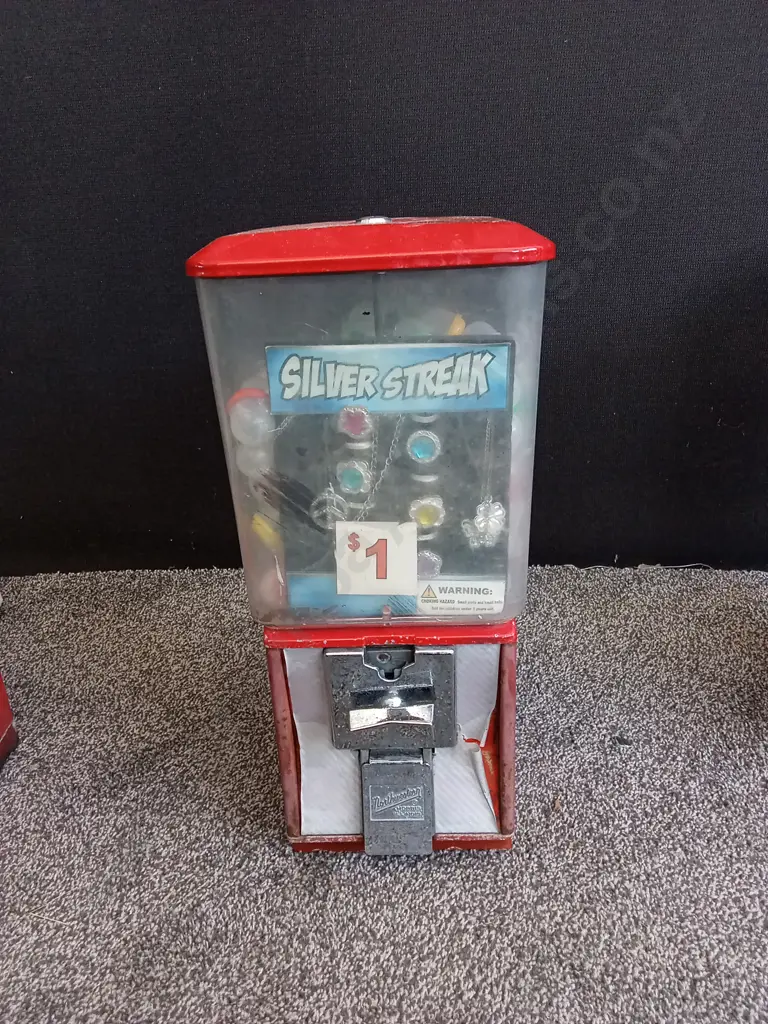 NORTHWESTERN SINGLE RED VENDING MACHINE COMPLETE WITH STOCK Image 1++