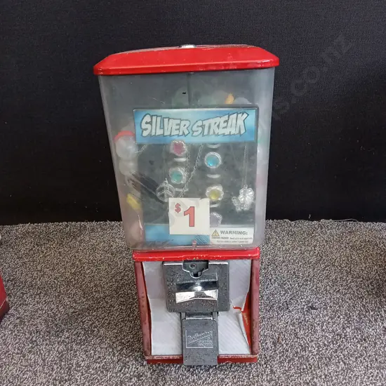 NORTHWESTERN SINGLE RED VENDING MACHINE COMPLETE WITH STOCK