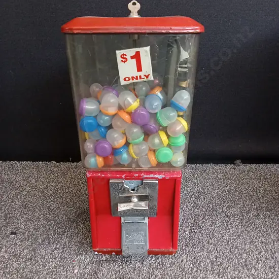 NORTHWESTERN SINGLE RED VENDING MACHINE COMPLETE WITH STOCK