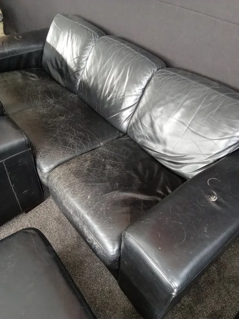 BLACK LEATHER LOUNGE SUITE VERY COMFORTABLE BUT NEEDS RESTORATION - 3 SEATER, 2 SEATER PLUS ARMCHAIR AND FOOT STOOL Image 1++