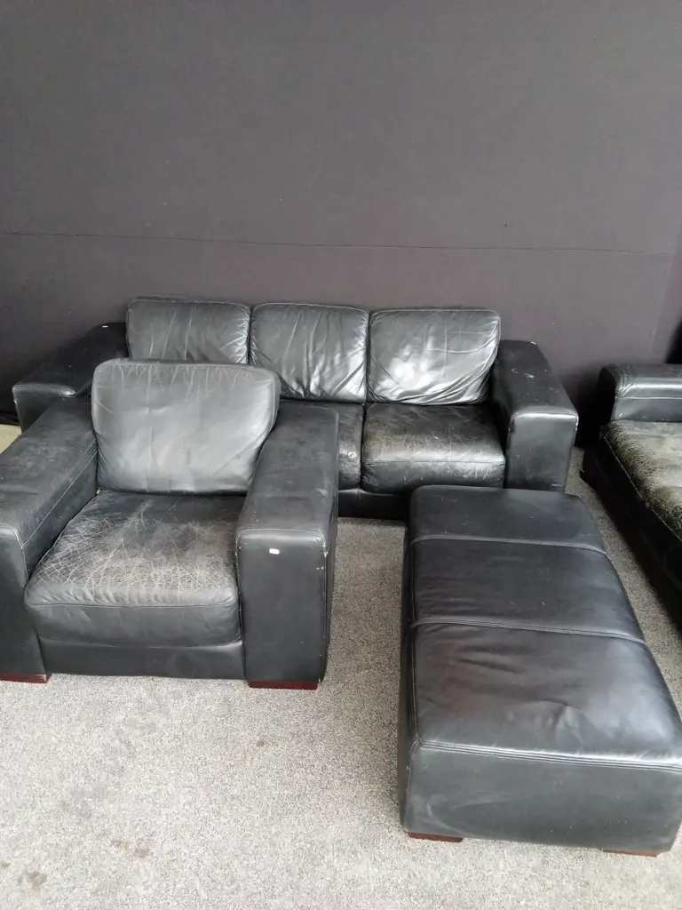 BLACK LEATHER LOUNGE SUITE VERY COMFORTABLE BUT NEEDS RESTORATION - 3 SEATER, 2 SEATER PLUS ARMCHAIR AND FOOT STOOL Image 1++