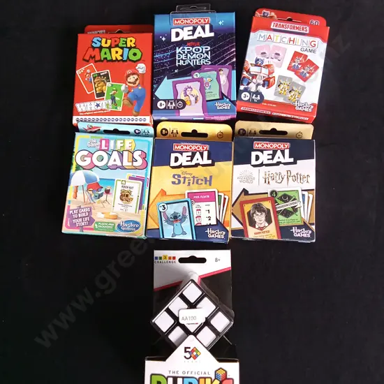 7 PIECES BRAND NEW CARD GAMES AND RUBIKS CUBE