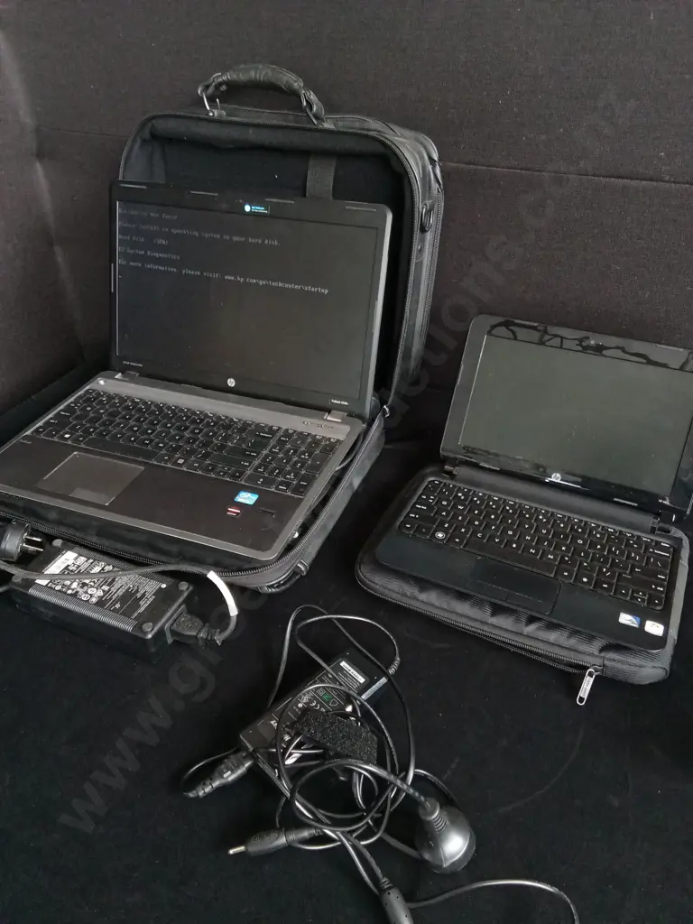 PAIR OF HP LAPTOPS 10 INCHES AND 15 INCHES INCLUDES CASES Image 1++