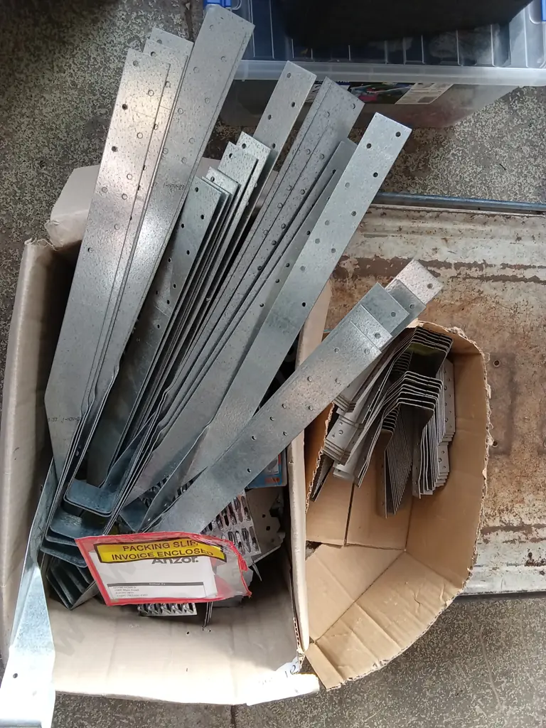 BOX OF GALVANIZED STEEL JOIST HANGERS AND METAL CONNECTORS Image 1++
