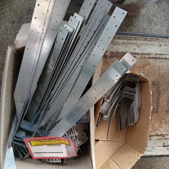 BOX OF GALVANIZED STEEL JOIST HANGERS AND METAL CONNECTORS