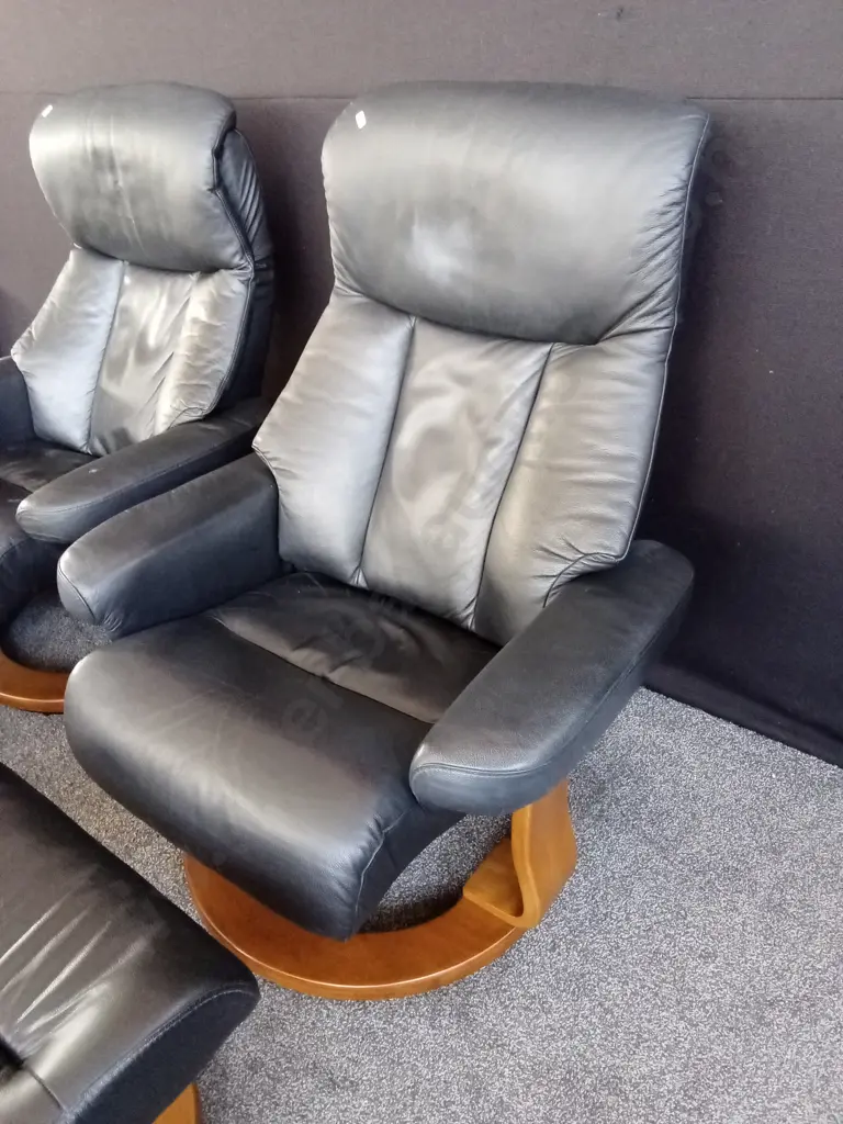 2 ROTATING LEATHER CHAIRS WITH FOOTSTOOLS Image 1++