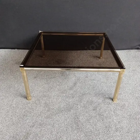 SQUARE GLASS TABLE WITH GOLD LEGS L 90CM H 41CM (Corner little chip)