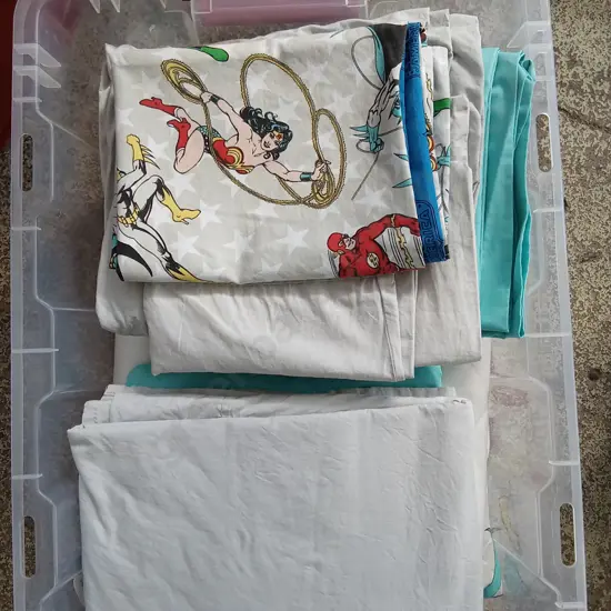 BOX OF BEDDING, INCLUDING DC JUSTICE LEAGUE SHEETS
