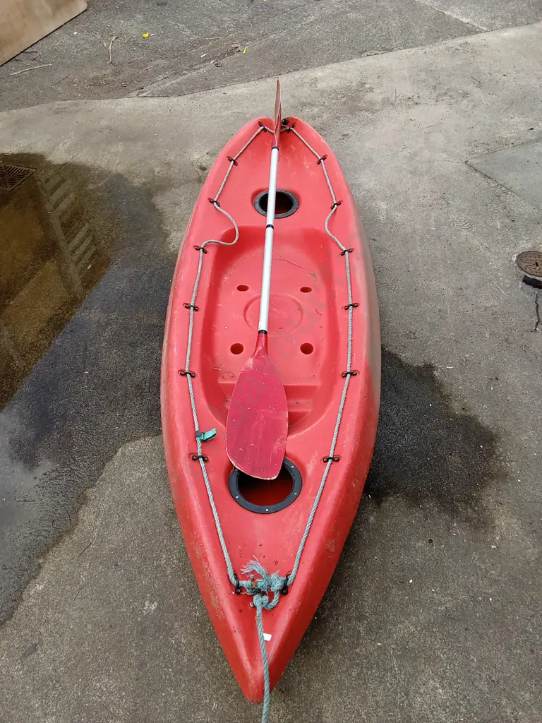 RED KAYAK WITH PADDLE Image 1++