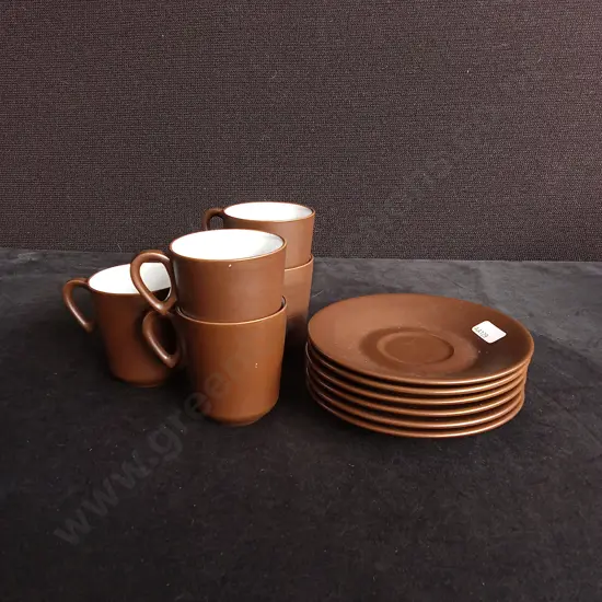 11 PIECE SET OF CERAMIC CUPS AND SAUCERS
