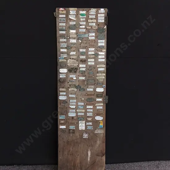 DISPLAY BOARD FEATURING COLLECTION OF ANTIQUE AND VINTAGE UPHOLSTERY, FURNISHING AND BEDDING MANUFACTURER PLAQUES