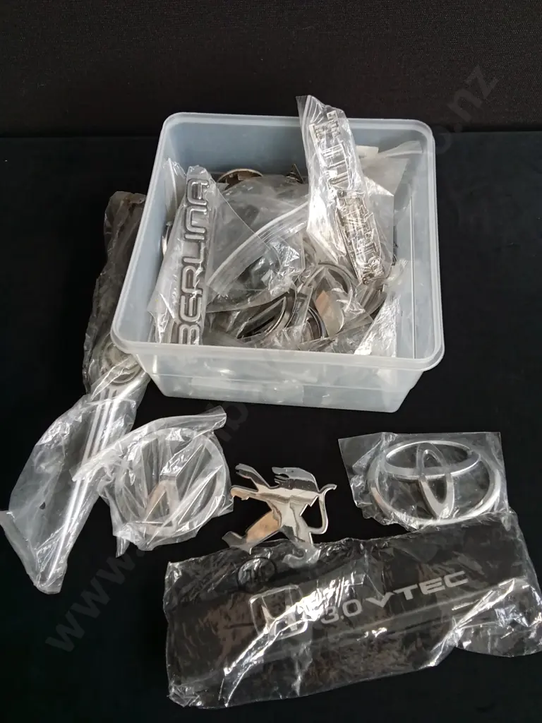 BOX OF CAR EMBLEMS Image 1++