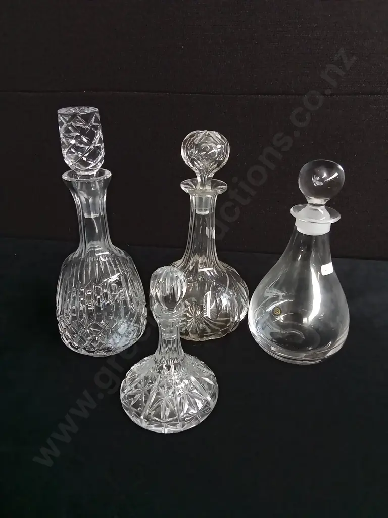 4 PIECES GLASS DECANTERS Image 1++