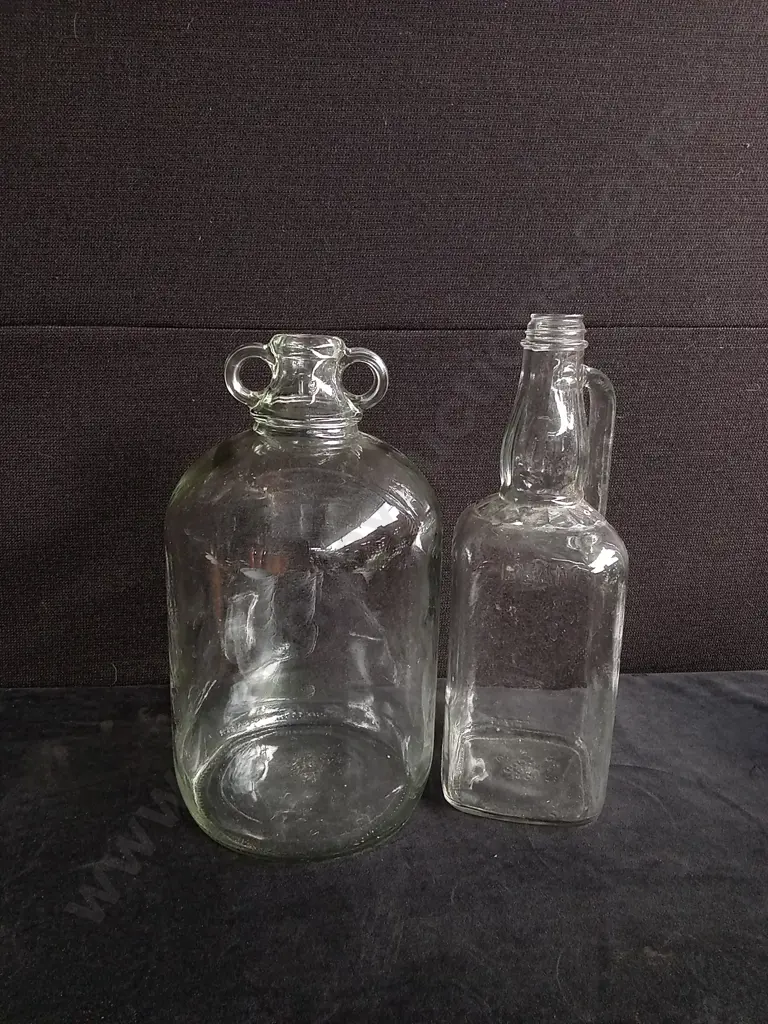 2 PIECES LARGE VINTAGE GLASS BOTTLES Image 1++