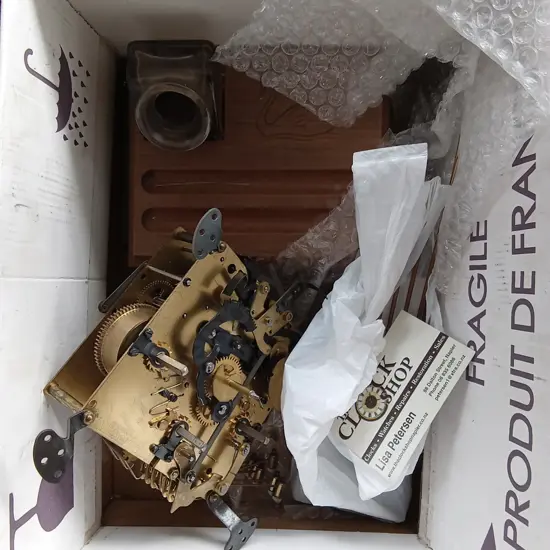 BOX MIX INCLUDING MECHANICAL CLOCK MOVEMENT