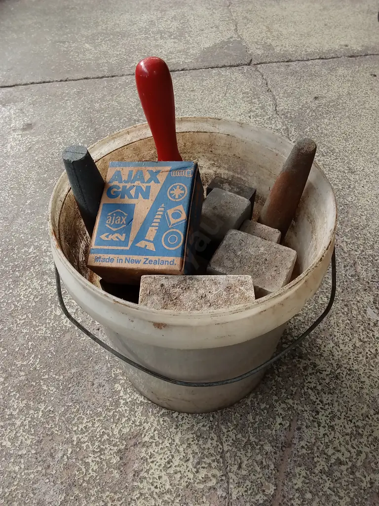 BUCKET OF CONCRETE BLOCKS AND TOOLS Image 1++