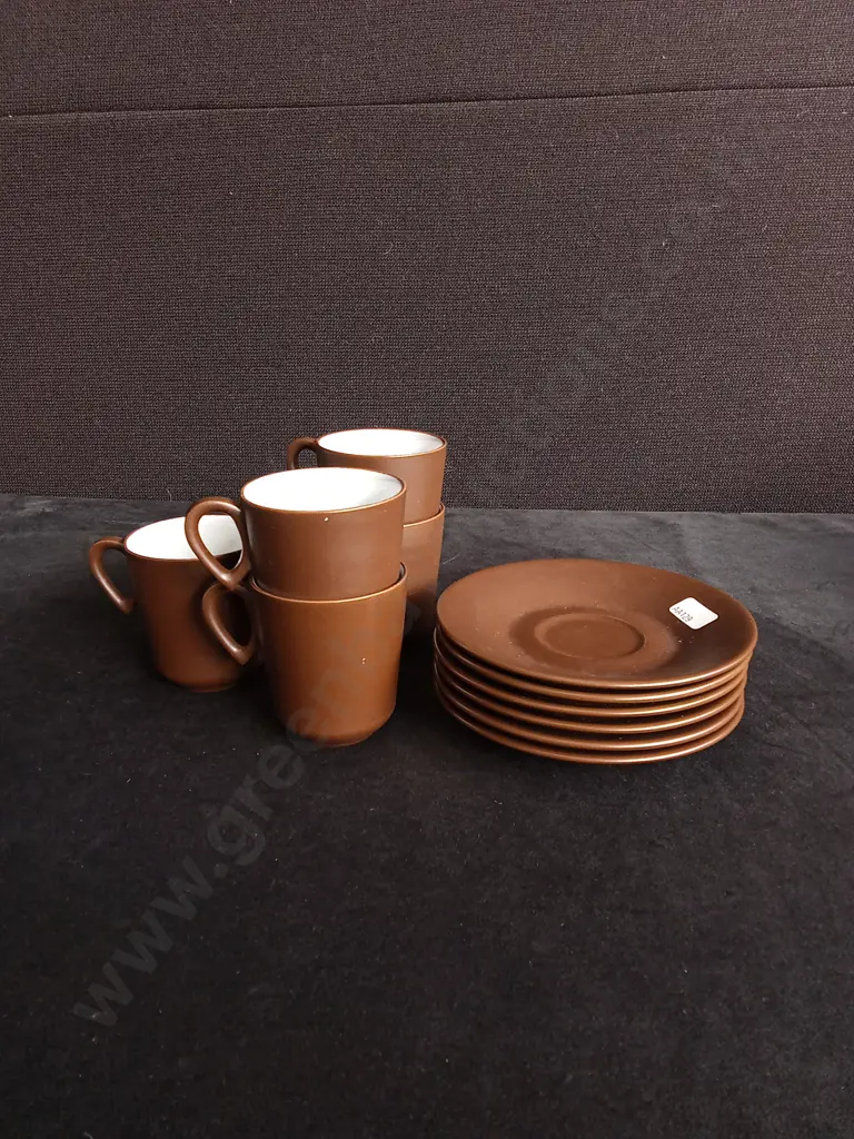 11 PIECE SET OF CERAMIC CUPS AND SAUCERS Image 1++