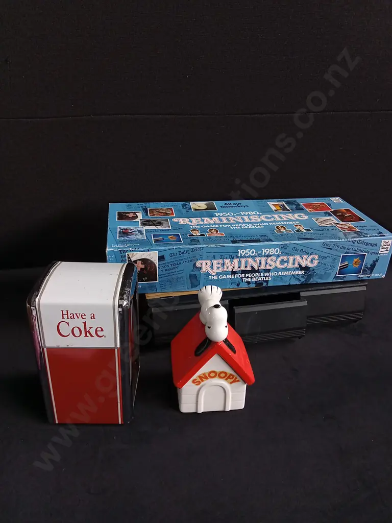 4 PIECES MIX OF VINTAGE ITEMS, BOARD GAME, COKE NAPKIN HOLDER, SNOOPY MONEY BOX, VHS TAPE STORAGE Image 1++
