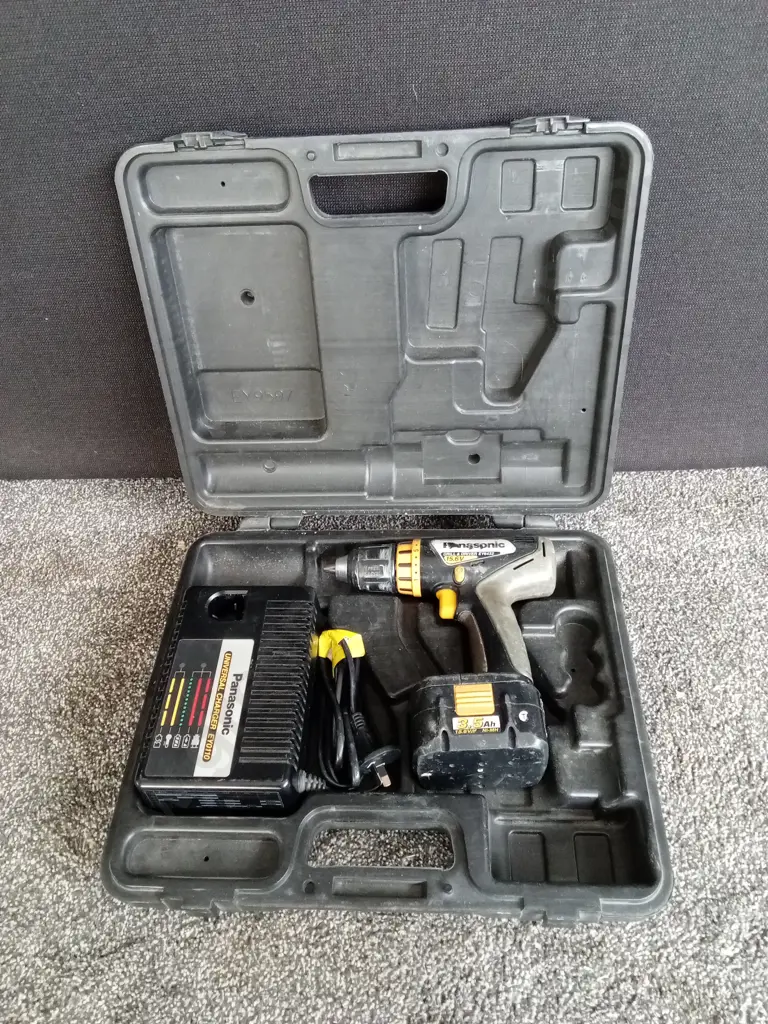 PANASONIC DRILL & DRIVER EY6432 AND UNIVERSAL CHARGER Image 1++