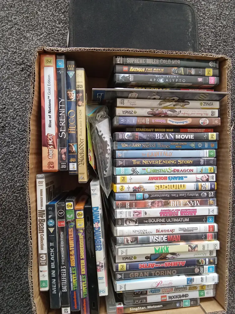 BOX OF DVDS AND VIDEO GAMES Image 1++